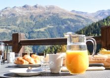 Chalet breakfast with mountain views