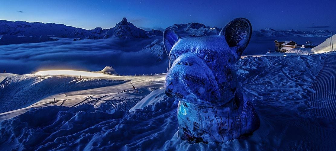 Snow sculpture of a dog in Courchevel