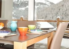 Enjoy breakfast with views over the alpine covered mountains