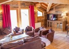 The open plan lounge of catered chalet mira