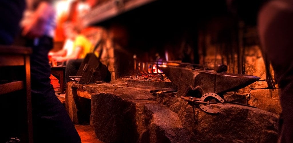 A roaring fire warms Bar La Mine