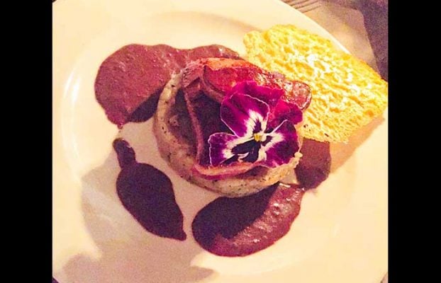 Duck breast served with a flower at L’etale