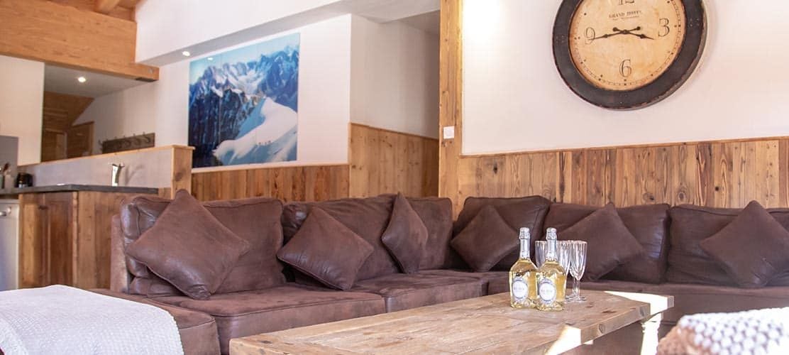 A comfy sofa in the lounge of Chalet Mira