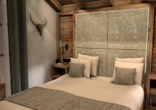 Stylish double bedroom in catered ski chalet