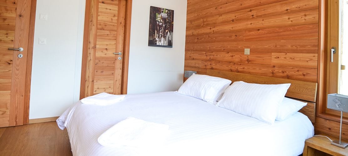 Double bedroom with crisp white linen