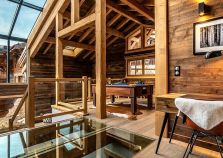 Glass floor ski chalet