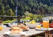 Outdoor dining in this 15th century style chalet