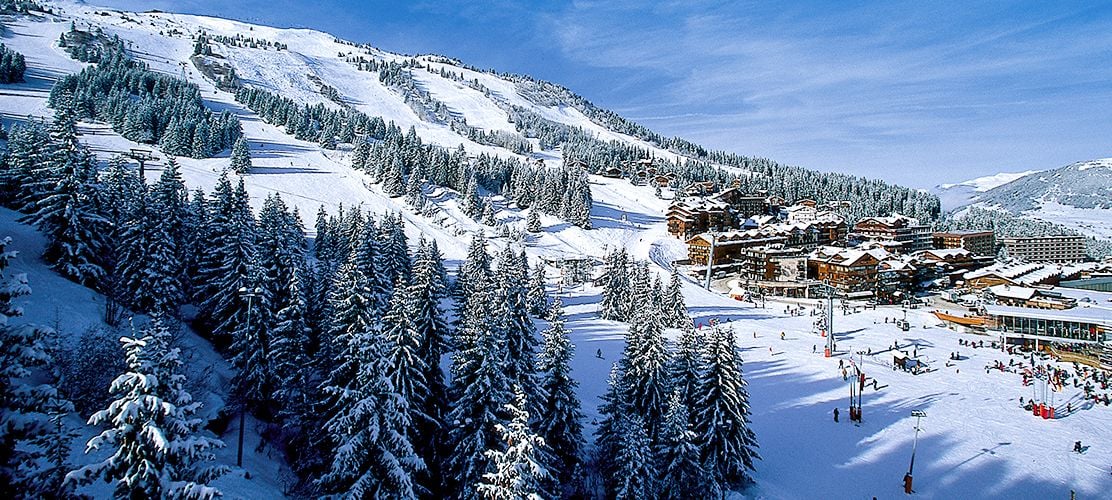 looking over the trees at Courchevel le praz