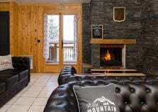 The lounge at catered chalet Ammonite