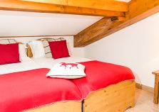 Spacious twin bedroom in the penthouse chalet