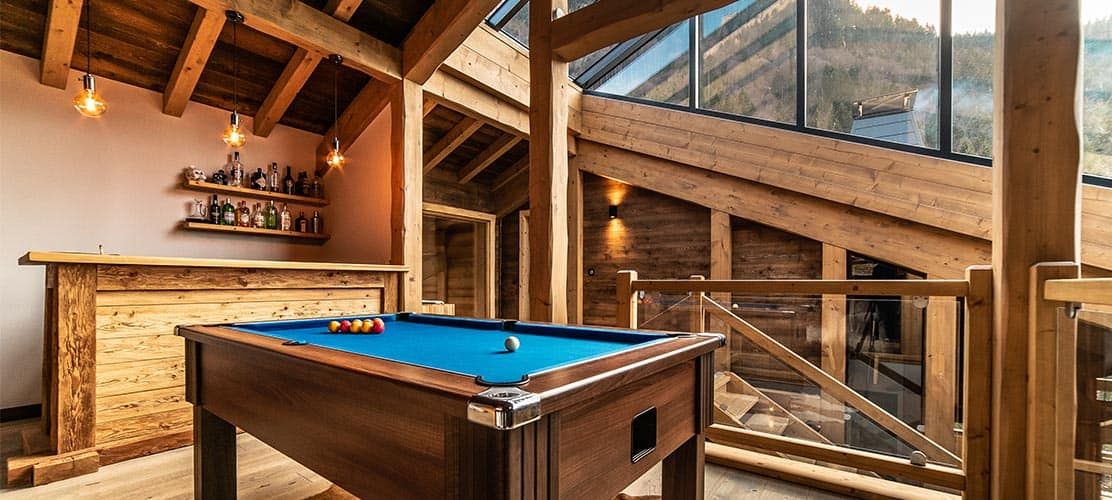 Glass atrium & pool table in Morzine chalet