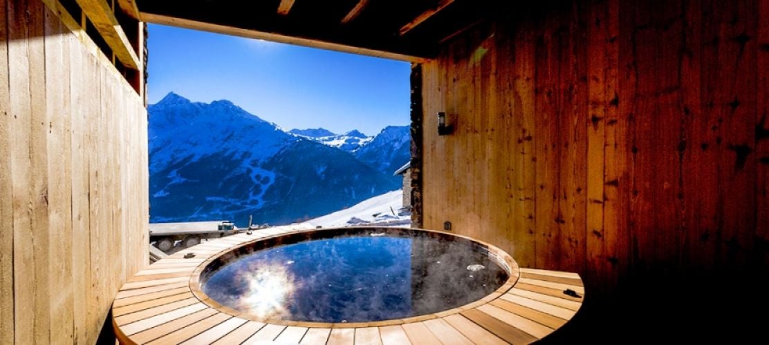 The gorgeous covered hot tub