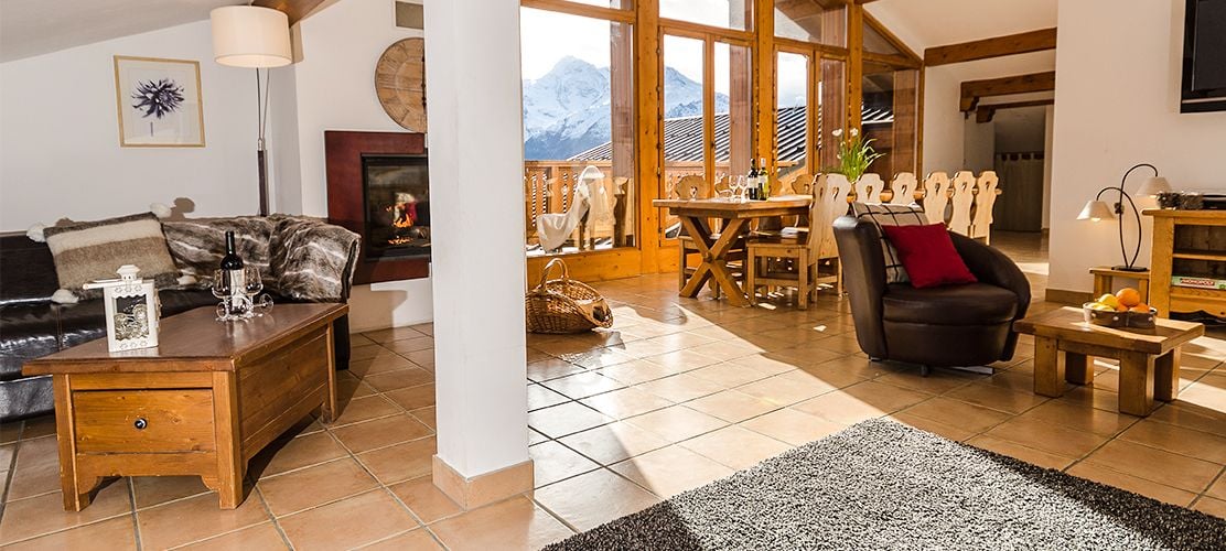 A huge living space in the chalet with full length windows