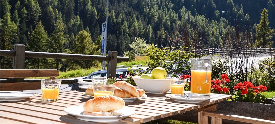 Outdoor dining in this 15th century style chalet