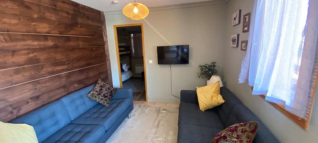 Lounge area of ski apartment in Montalbert