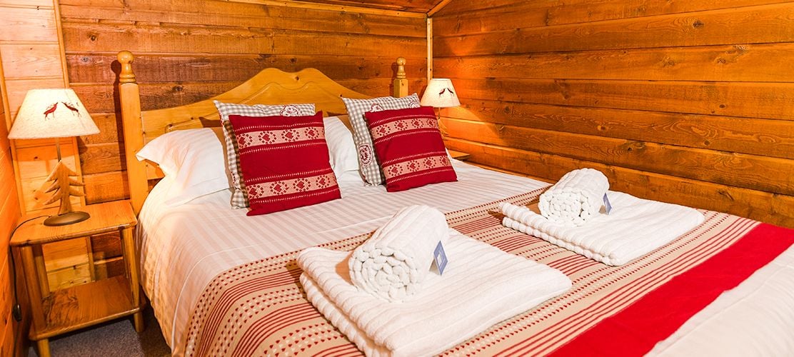 A double bedroom of Chalet Soleil