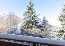 Exterior balcony of chalet Ammonite with views of La Plagne 1800