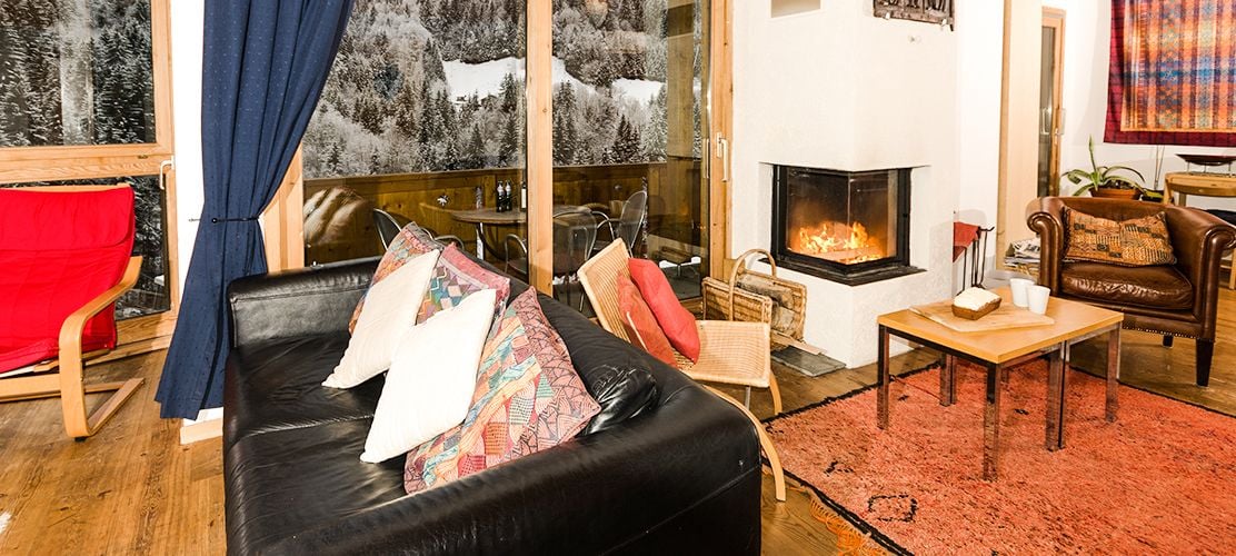Cosy lounge with roaring fire