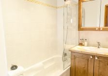 Bathroom with shower and bath