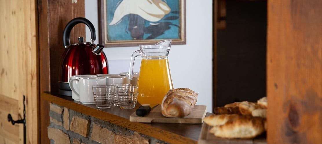 Chalet breakfast spread in catered chalet in La Plagne