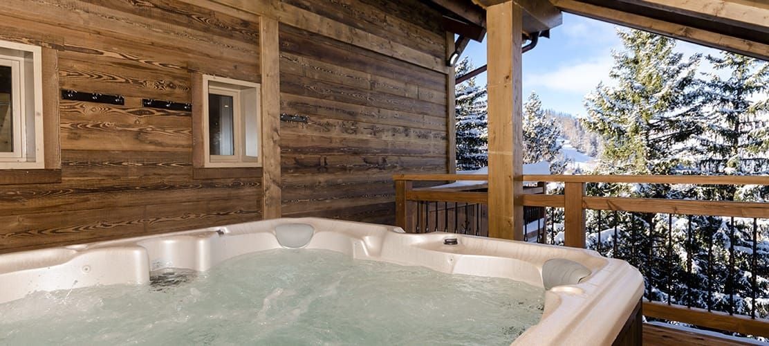 The newly installed hot tub with views of La Plagne